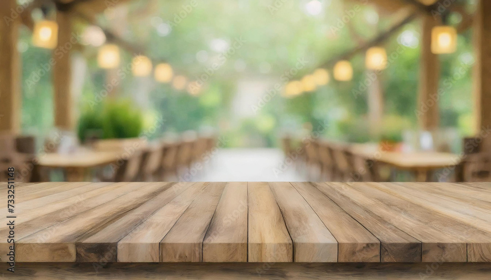 Empty rustic wood table with blurred soft light table in restaurant ...