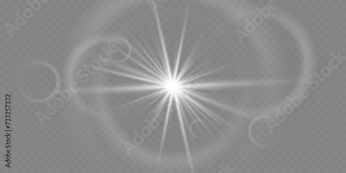 Bright white rays of light and sun, spotlights, illumination on a transparent background 