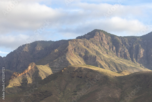 Hills of volcanic rock above town og Agaete Gran Canaria Spain.