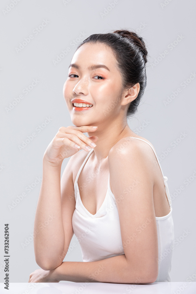 Beautiful Asian woman looking at camera smile with clean and fresh skin Happiness and cheerful with positive emotional,isolated on white background. Beauty and Cosmetics Concept. Proud her self. Beautiful Asian woman looking at camera smile with clean and fresh skin Happiness and cheerful with positive emotional,isolated on white background. Beauty and Cosmetics Concept. Proud her self.