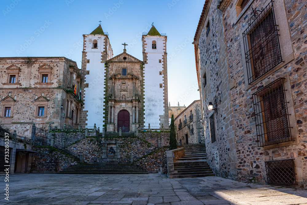 White-towered church in the square of the medieval town of Caceres, Extremadura.