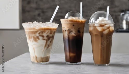 Three glasses of iced coffee on a table