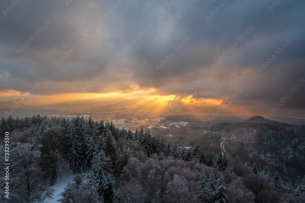 custom made wallpaper toronto digitalThe golden rays of the setting sun shine over the mountain peaks onto the Murg valley in the snow-covered northern Black Forest