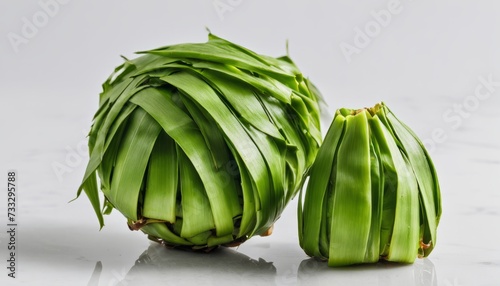 Two green leafy vegetables on a white background photo