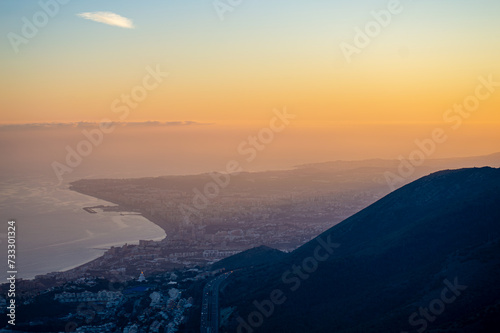 Sunset over Mediterranean sea and Fuengirola from Calamorro peak, Costa del Sol, Andalusia, Spain