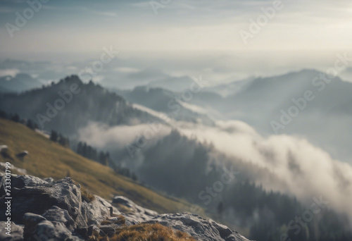 Mountain landscape in the morning Mystic fog in mountains Rocky peaks in fog Clouds in mountains