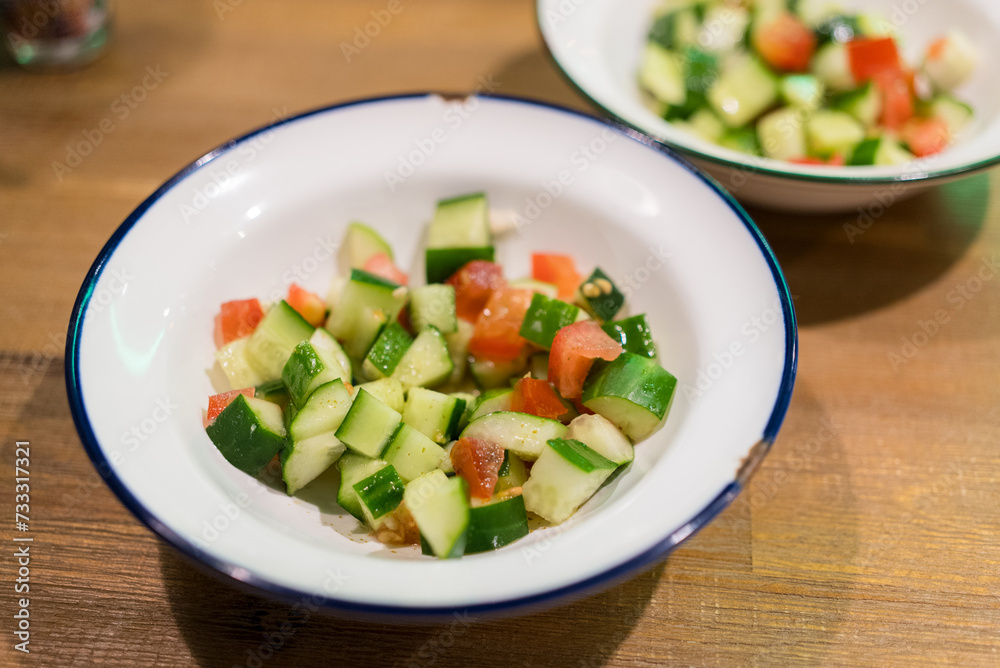 Fresh cucumber salad in the dish Fresh cucumber salad in the dish
