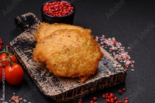 Delicious crispy pancakes made from potatoes  meat  carrots  onions