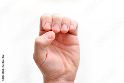 Man hand manicure close up view on white background