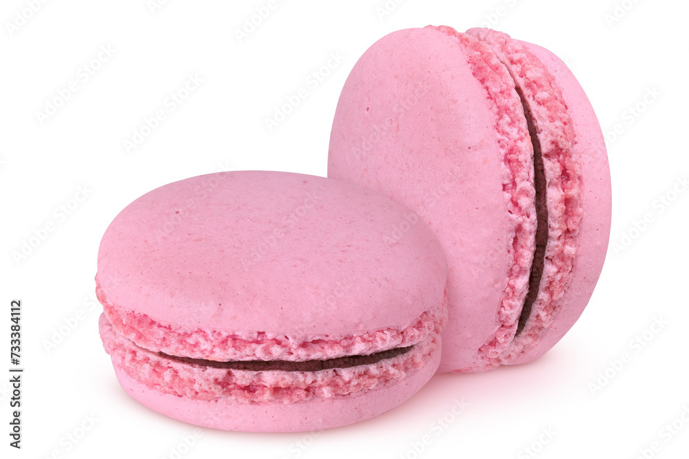 Pink macarons with chocolate filling on isolated white background Pink macarons with chocolate filling on isolated white background