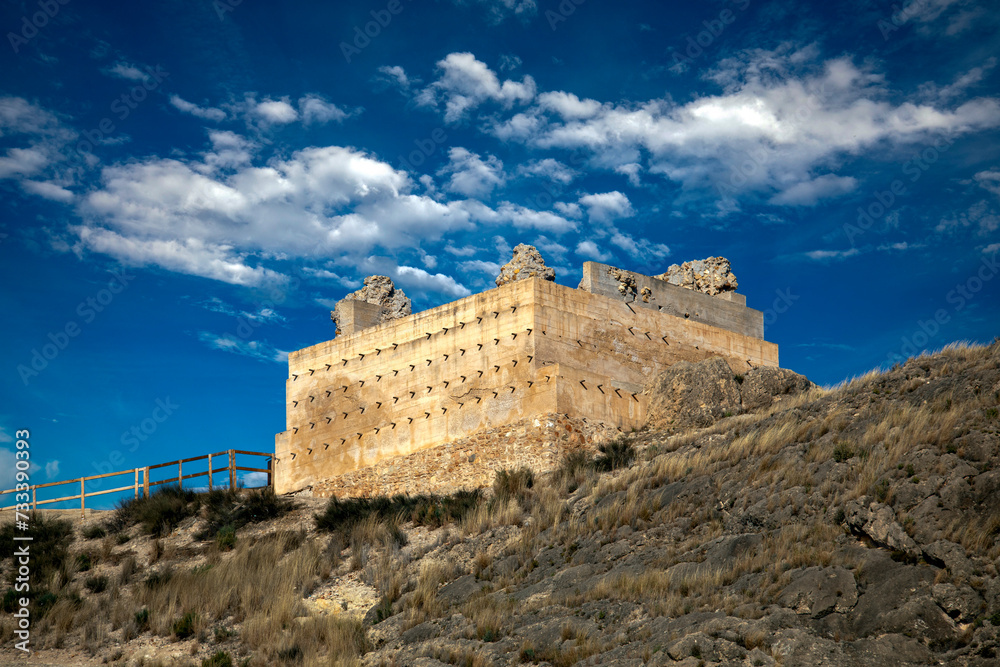 View from below, of the main tower of the San Juan castle in Calasparra, Region of Murcia, Spain, on a sunny day