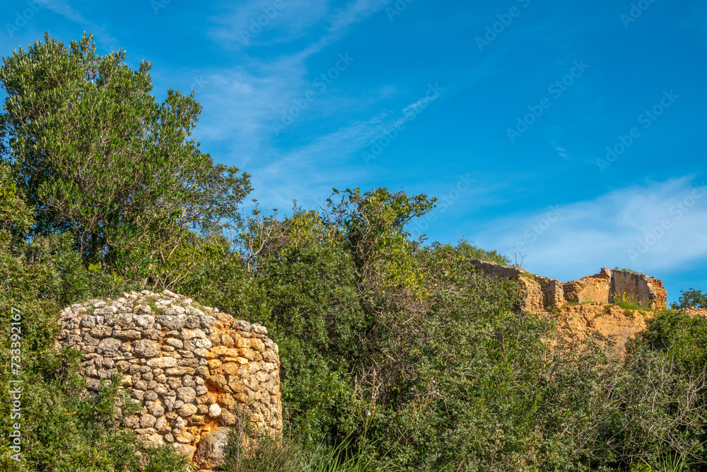 Ruins of old farming houses dot the charming landscapes of the Algarve region of Portugal