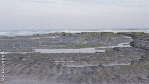 Drone Aerial Atlantic Ocean Seascape and Sagres Coastline Cliffs, in Algarve region, a Worldwide Popular Beach and Nature Destination, at South Portugal.