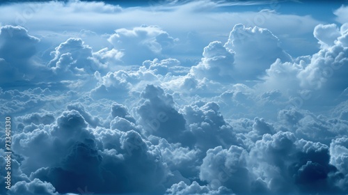  a group of clouds in the sky with a bright blue sky in the middle of the picture and a few white clouds in the middle of the middle of the picture.