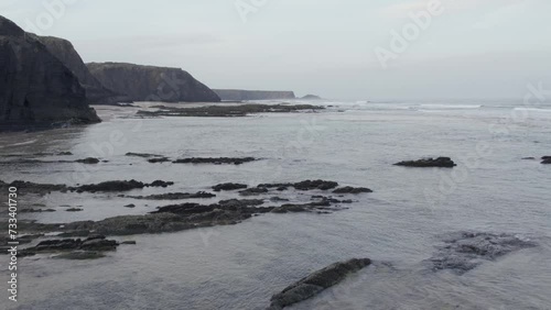 Drone Aerial Atlantic Ocean Seascape and Sagres Coastline Cliffs, in Algarve region, a Worldwide Popular Beach and Nature Destination, at South Portugal.
