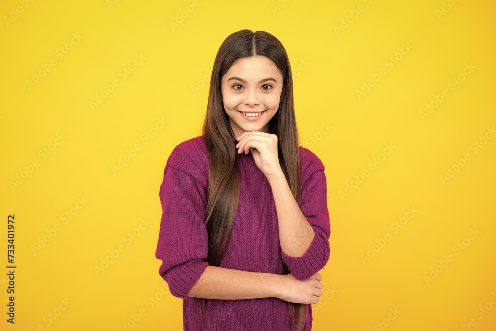 Children studio portrait on yellow background. Childhood lifestyle concept. Cute teenage girl face close up. Children studio portrait on yellow background. Childhood lifestyle concept. Cute teenage girl face close up.