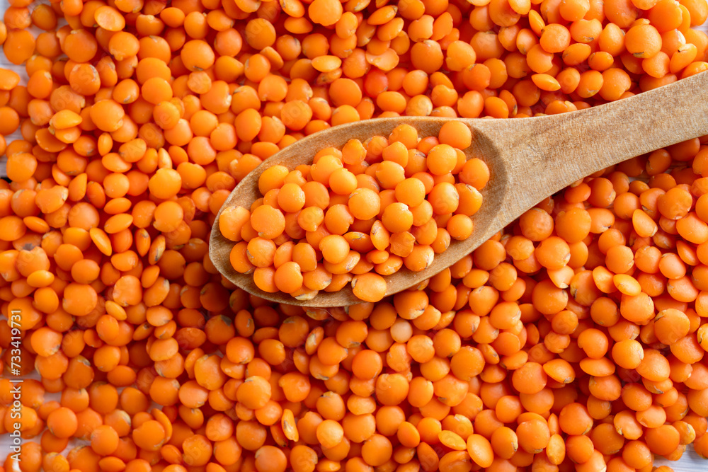 Uncooked red lentils. Red lentils background Uncooked red lentils. Red lentils background