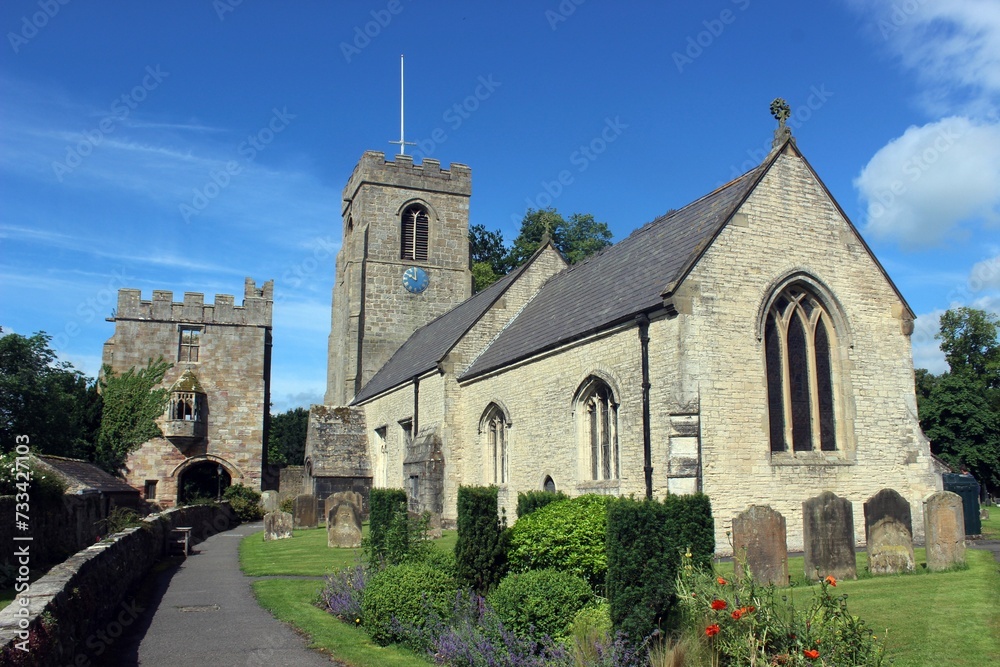 Fototapeta premium Marmion Tower and St Nicholas' Church, West Tanfield, North Yorkshire.