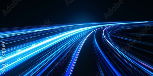 Blue light trails create a dynamic and futuristic abstract image representing speed and technology.