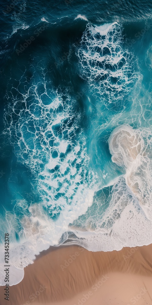 Naklejka premium drone view of waves on the beach