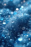 A close-up macro shot of blue sparkles, providing a magical and enchanting texture that can serve as a luxurious wallpaper or background..