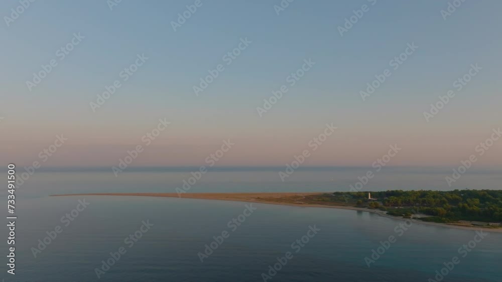 Drone retreats back, unveiling Possidi Cape at dawn in Halkidiki, Greece Drone retreats back, unveiling Possidi Cape at dawn in Halkidiki, Greece