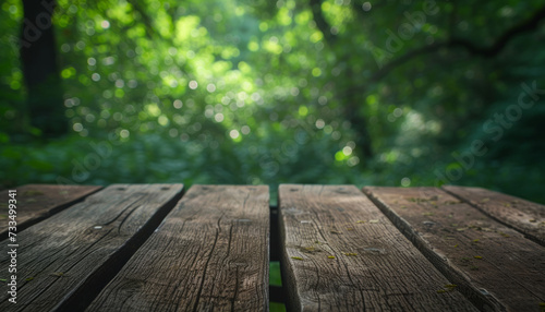 Wooden Table Perspective in a Lush Forest with Sunlight Bokeh