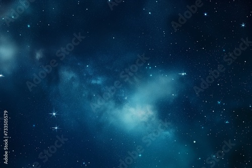Deep Blue Nebula Background with Stars and Cosmic Dust in Outer Space © Sol Revolver Group
