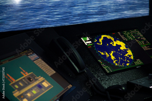 Display of radar, radio, AIS and ECDIS screens in the ship simulator navigation room