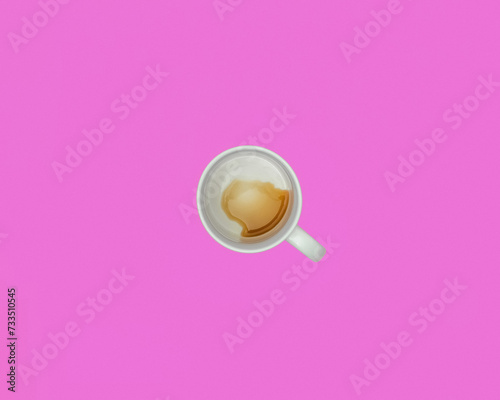 Quadro su tela Overhead view of a nearly empty cup of coffee or tea