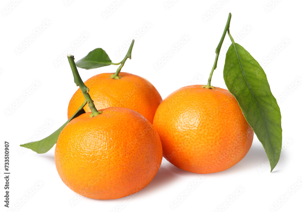 Fresh ripe juicy tangerines with green leaves isolated on white Fresh ripe juicy tangerines with green leaves isolated on white