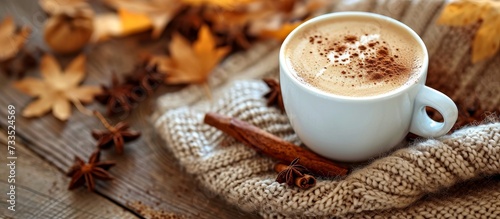 Morning coffee  a bag of Arabica  with milk and cinnamon  brings cheer  energy  lacey background  cappuccino or espresso.