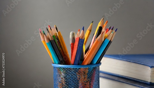 pencils in a glass wallpaper colorful pencil art close-up backdrop flaming boxing glove on neutral background, boxer fist on fire, abstract photo