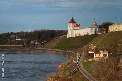 View of the Grodno Old Castle (Grodno Upper Castle) on the banks of the Neman River on a sunny day, Grodno, Belarus