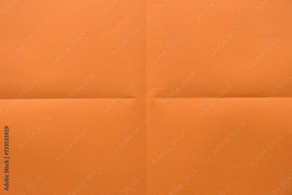 Fototapeta premium Folded orange color paper for background.