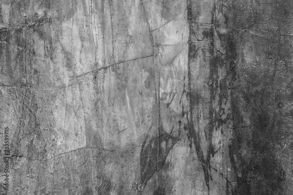 Texture of an old gray concrete wall use as background.
