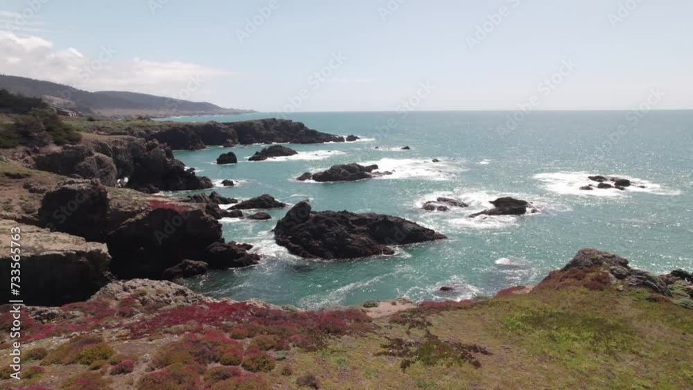 Cliffs overlooking the sea waves Cliffs overlooking the sea waves