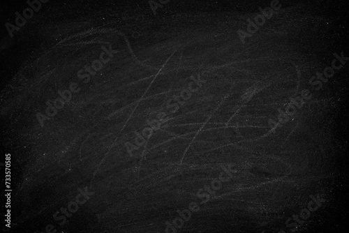 Abstract Chalk rubbed out on blackboard or chalkboard texture. clean school board for background or copy space for add text message. Backdrop of Education concepts. photo