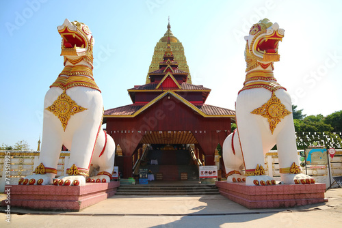Wat Wang Wiwekaram Temple with Chedi Buddhakhaya Stupa Built in the Style of Buddhagaya Mahabodhi in India, Kanchanaburi, Thailand photo