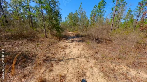 Dirt bike riding on off road trails motorcycle pov 4k photo