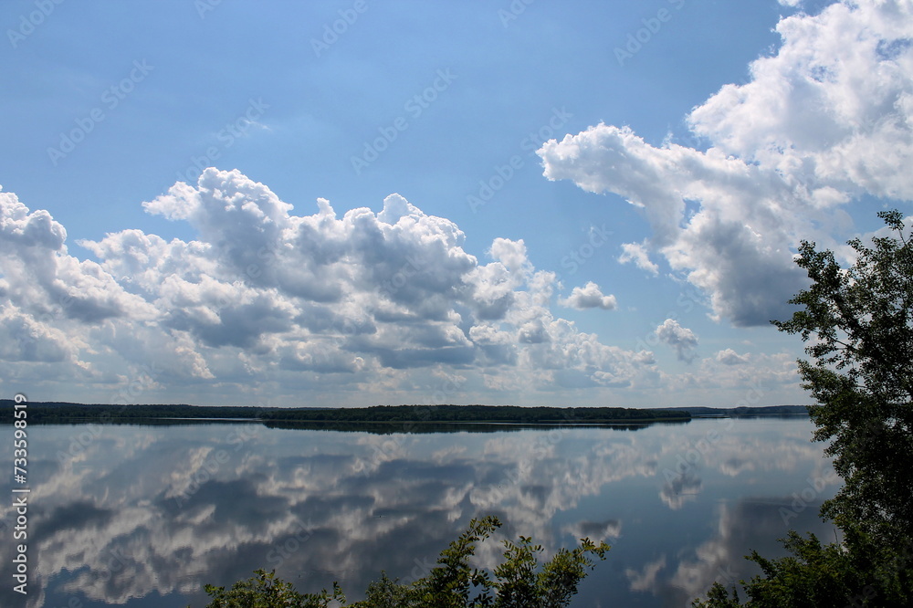 Forest lake and blue sky. Republic of Karelia, Russia.