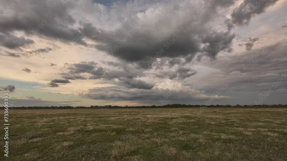 Time Lapse, Overcast Sky, Storm Clouds Gathering Over Open Field at Dusk Time Lapse, Overcast Sky, Storm Clouds Gathering Over Open Field at Dusk