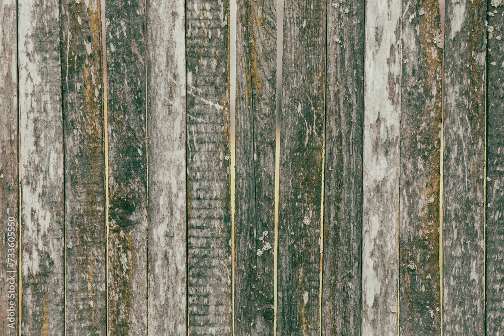 Obraz premium Boards on an old wooden fence as an abstract background. Texture