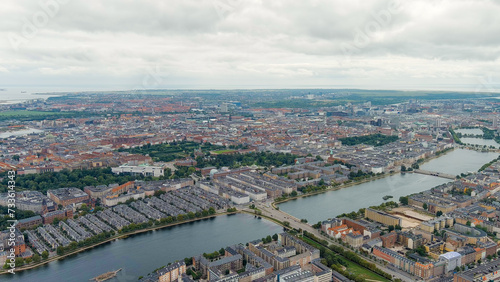Fototapeta Naklejka Na Ścianę i Meble -  Copenhagen, Denmark. Copernhagen lakes. Panorama of the city center in cloudy weather. Summer day, Aerial View