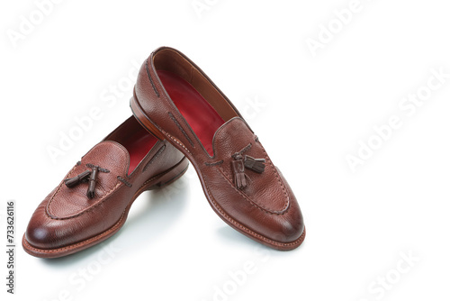 Two Traditional Formal Stylish Brown Pebble Grain Tassel Loafer Shoes On White