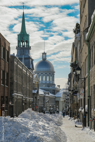 Massive snow and ice in downtown Montreal Montréal Quebec, Canada on sunny day with blue sky winter wonderland scenery