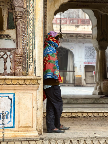 Galta Ji, India - January 4, 2024: A female tourist near Galta Mandir palace