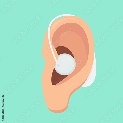 human ear with heaing aid attached