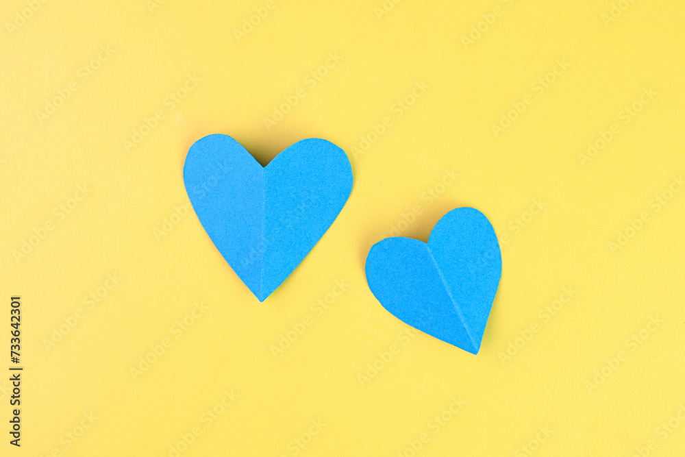 Love hearts on yellow background.