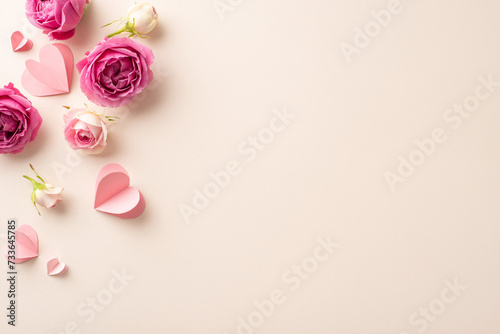 Commemorate March 8 with top view picture of thin paper hearts and lush roses set against a light beige background, designed to leave space for your own message or advertisement
